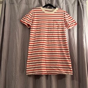 Cream white dress with red and maroon stripes.